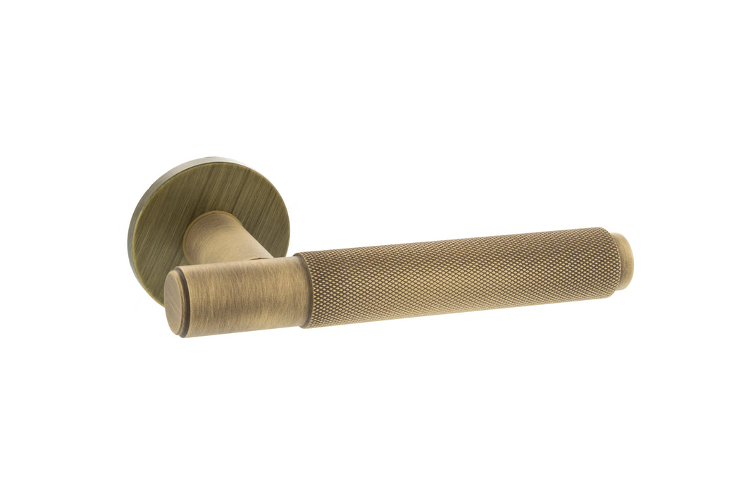 Millhouse Brass Crompton Knurled Lever Door Handle on 5mm Slimline Round Rose - Yester Bronze