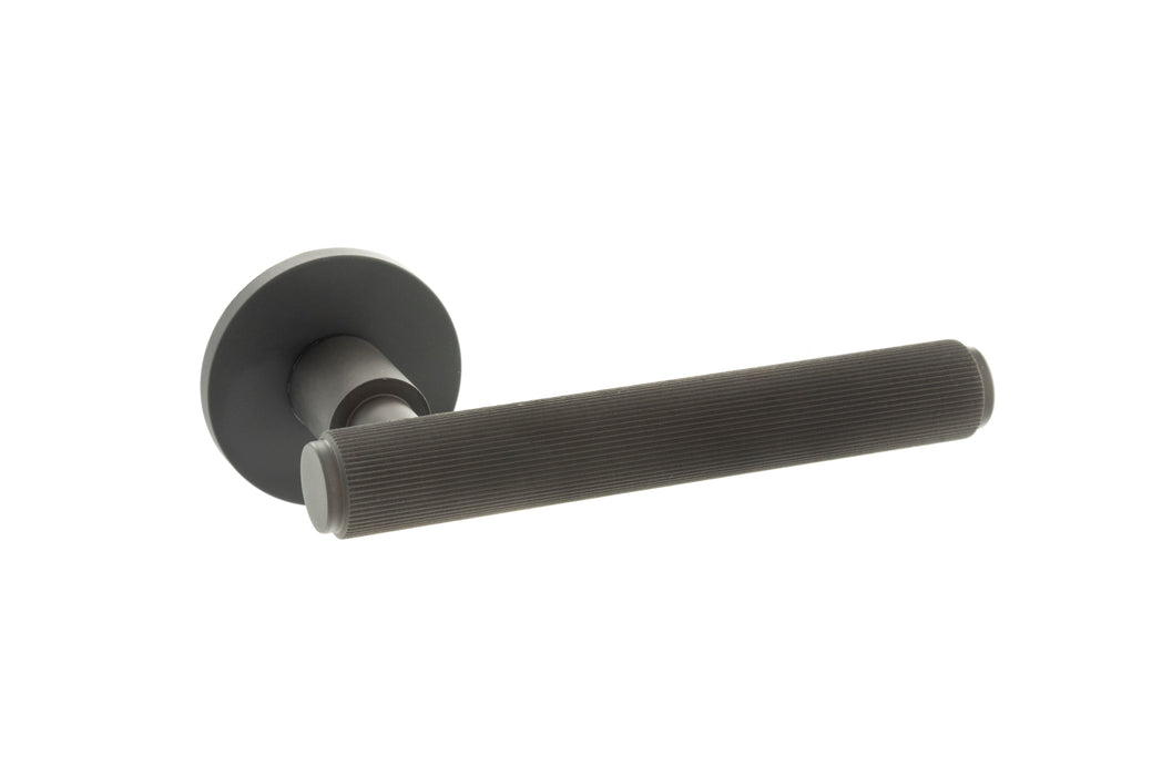 Millhouse Brass Stephenson Knurled Lever Door Handle on 5mm Slimline Round Rose - Urban Dark Bronze