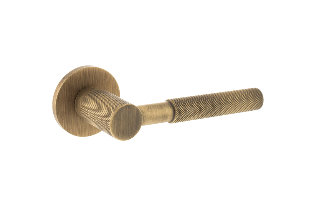 Millhouse Brass Mason Knurled Lever Door Handle on 5mm Slimline Round Rose - Yester Bronze