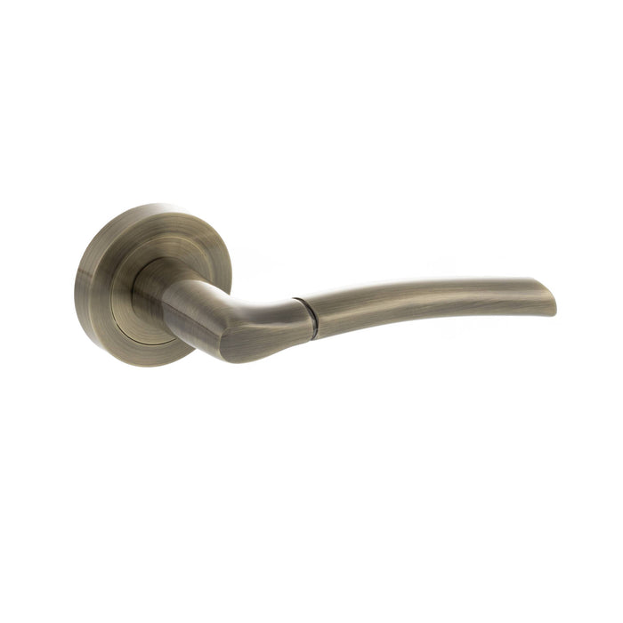 STATUS Indiana Lever Door Handle on Round Rose - Antique Brass