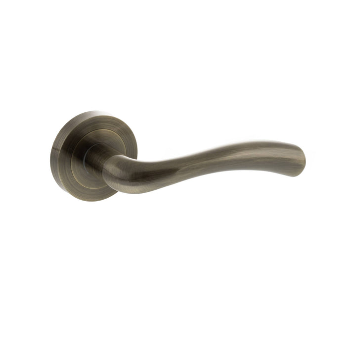 STATUS Texas Lever Door Handle on Round Rose - Antique Brass