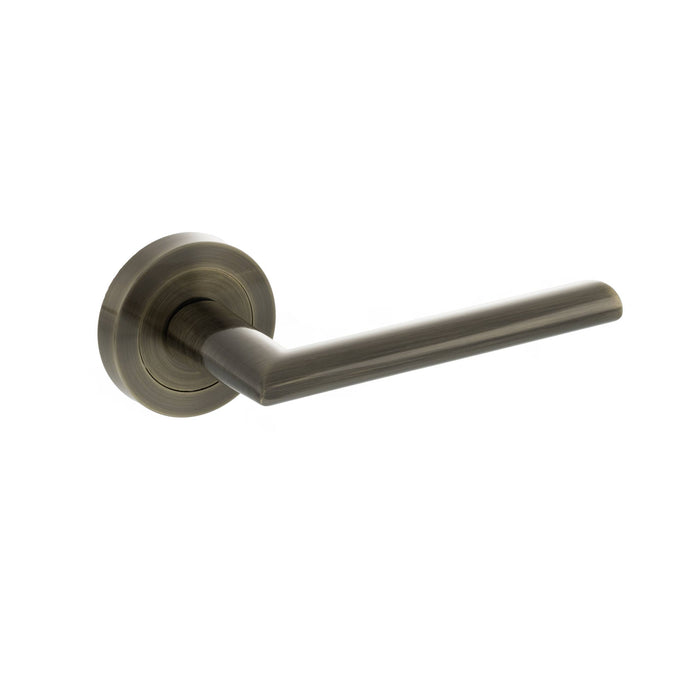 STATUS Alabama Lever Door Handle on Round Rose - Antique Brass