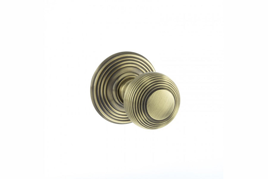 Old English Ripon Solid Brass Reeded Beehive Mortice Door Knob on Concealed Fix Rose - Antique Brass